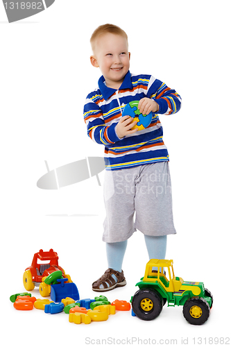 Image of Child playing with toys on white background