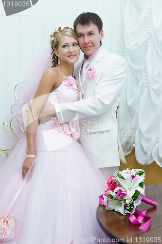 Image of Bride and groom in wedding attire