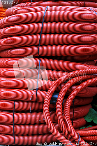 Image of Red hose coils