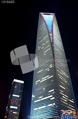 Image of Vertical skyscraper at night