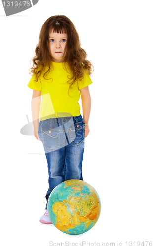 Image of Funny girl with a globe like a soccer ball