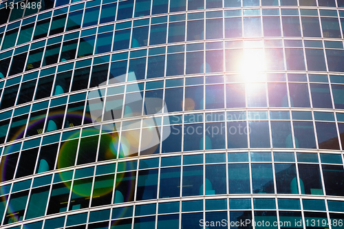 Image of Abstract view - skyscraper windows and solar flare