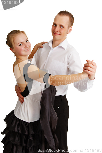 Image of Young couple dancing
