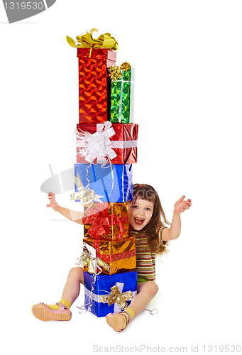 Image of Very happy child enjoys on holiday gifts