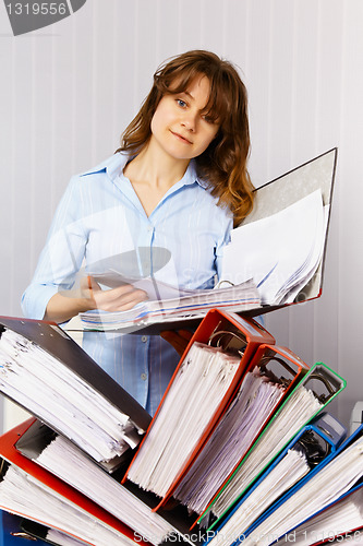 Image of Female accountant and financial documentation