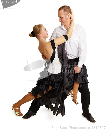 Image of Young couple dancing ballroom dance