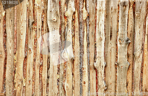 Image of Wooden planks and slabs fense