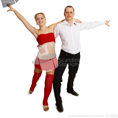 Image of cheerfully dancing young people on white