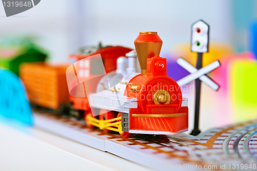 Image of Toy miniature locomotive on railroad