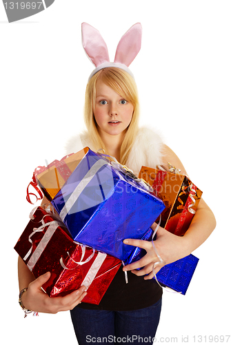 Image of Young blonde in a bunny suit with gifts