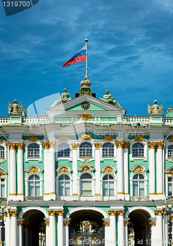 Image of Old European palace with Russian flag