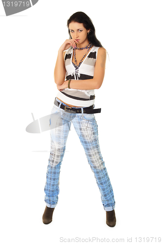 Image of Fashionably dressed young woman in jeans