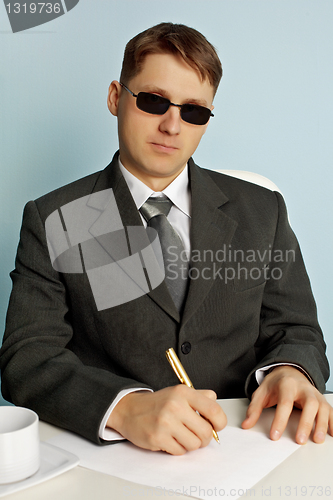 Image of Official from Intelligence service in the black glasses