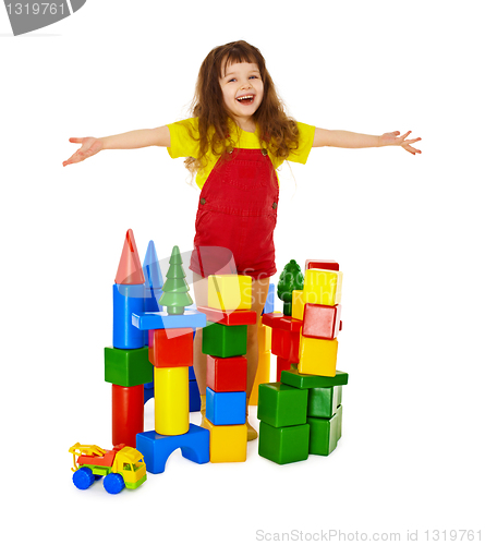 Image of Happy child in a toy castle