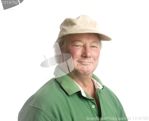 Image of middle age senior man wearing casual hat smiling