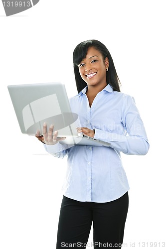 Image of Smiling woman with laptop computer