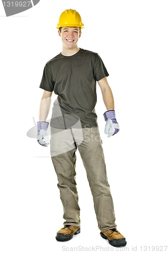 Image of Young construction worker smiling