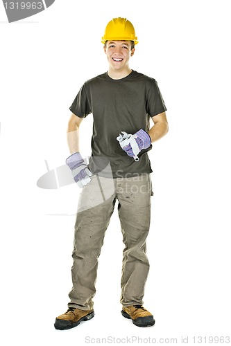 Image of Young construction worker smiling