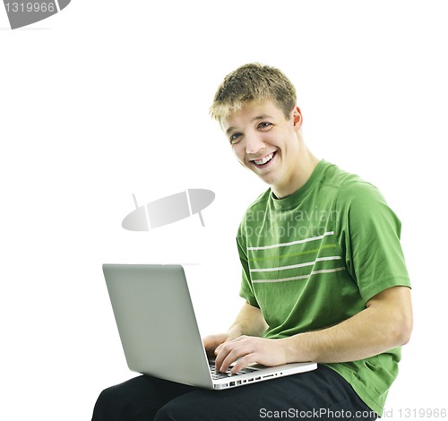 Image of Young man with laptop computer