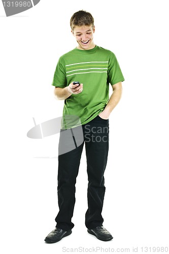 Image of Smiling young man holding cell phone