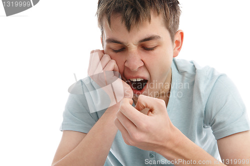 Image of Yawning tired or bored boy