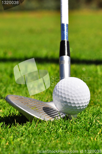 Image of Golf ball and driver