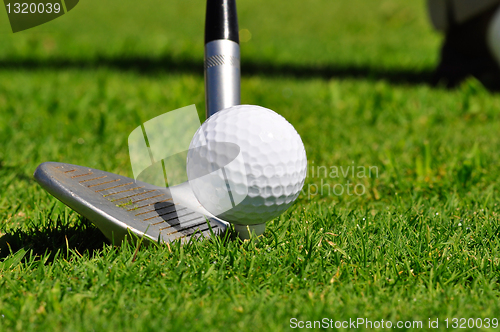 Image of Golf ball and driver