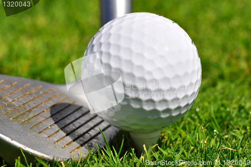 Image of Golf ball and driver