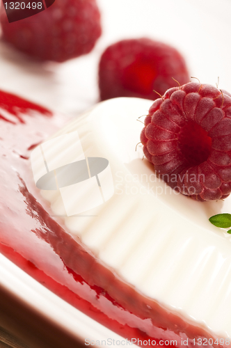 Image of Vanilla panna cotta with berry sauce