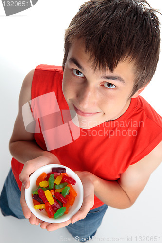 Image of Boy with lollies candy