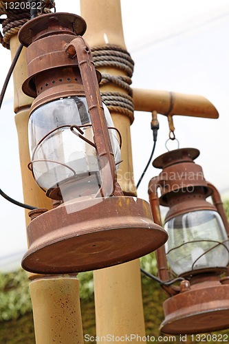 Image of rust and brocken kerosene lamp 