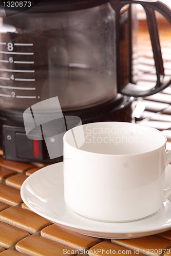 Image of coffee machine and cup 