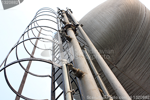 Image of Stainless steel stairway in the tanks of a modern winery 