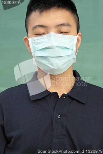 Image of man wear mask outdoor