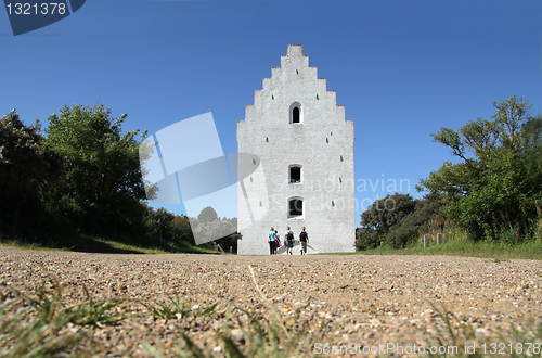 Image of White church tower.