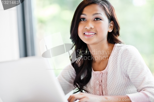 Image of Asian student on campus