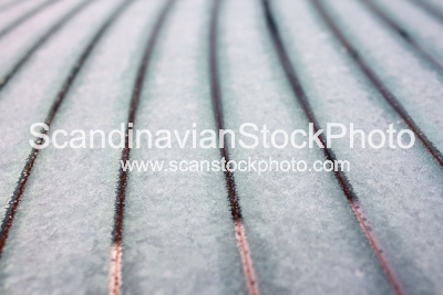 Image of Snow thawing on car window