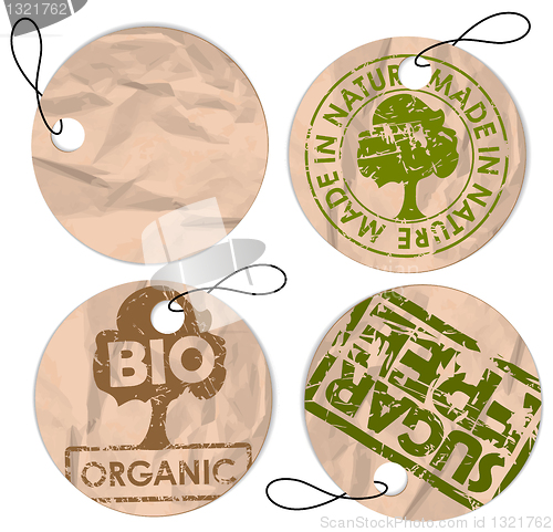 Image of Set of round grunge tags for organic food