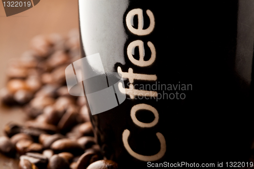 Image of Coffee beans and a coffee mug