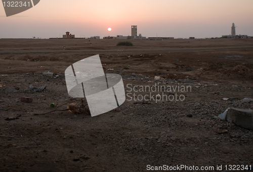 Image of sunrise in dirty suburb