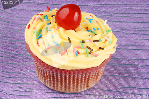 Image of Fancy cupcake with candied cherry