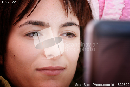 Image of Young woman with laptop 