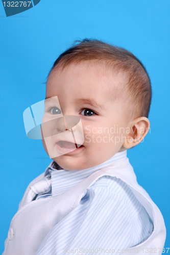 Image of Portrait of a happy baby boy Isolated on blue background