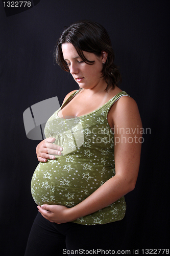 Image of beautiful pregnant woman expecting a boy