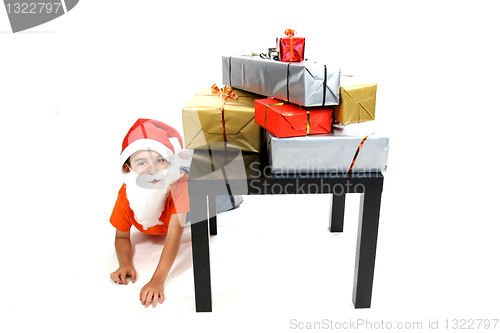 Image of boy with large present at christmas time