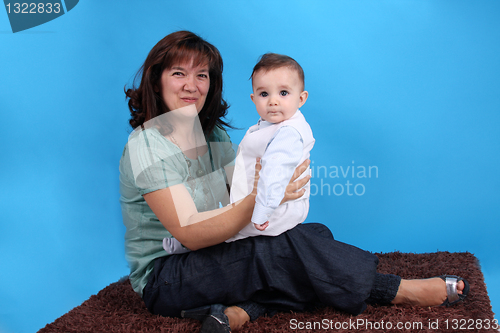 Image of Portrait of a beautiful happy mother with beautiful baby