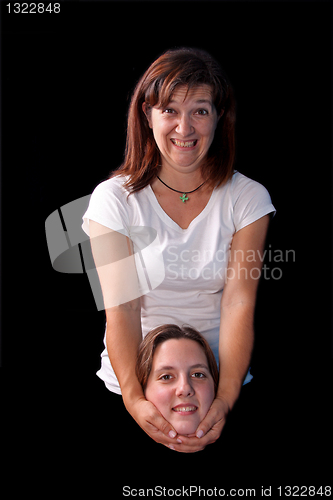 Image of woman with head in this hand on black background