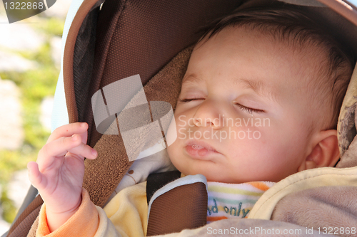 Image of sweet baby sleeping on a blanket, newborn baby