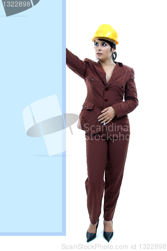 Image of Young woman holding blank board