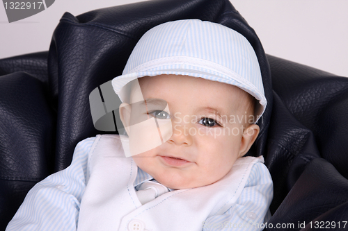 Image of Portrait of a happy baby boy, studio photo